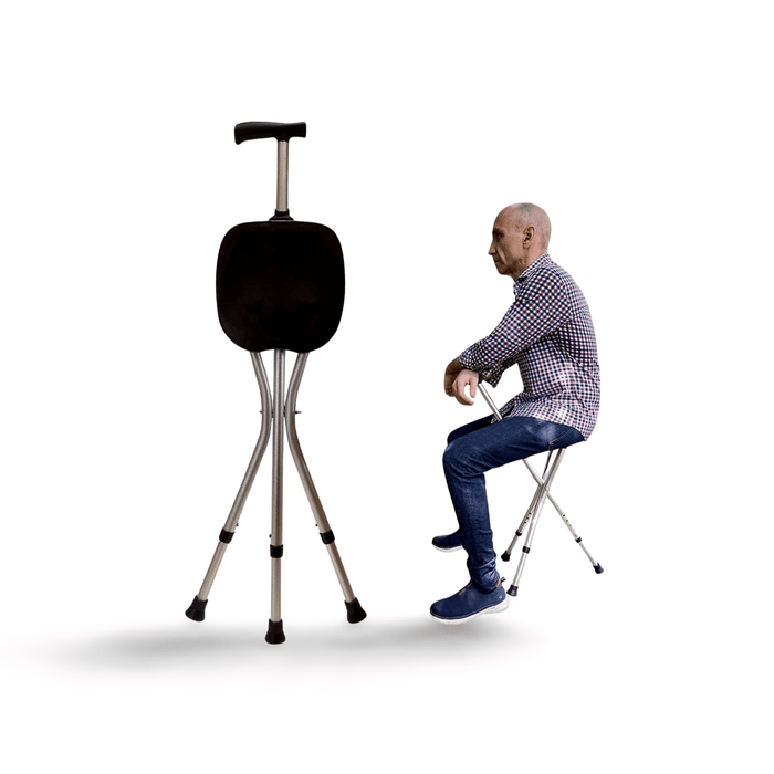 Deluxe walking stick with a fold-down seat, shown with a man seated on it