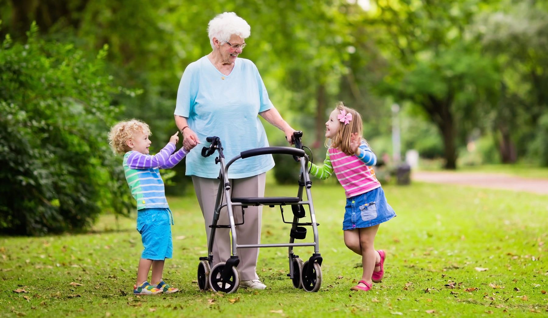 Older couple out and about with mobility aids on a summer trip in New Zealand