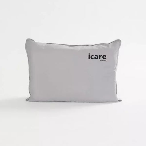 icare conform pillow with 'icare' branding on a white background