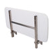 Viking folding padded shower seat folded against wall