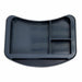 iCare organiser tray sitting on an over bed table holding a cup and a book