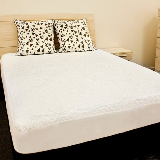 Waterproof Quilted Mattress Protector on bed