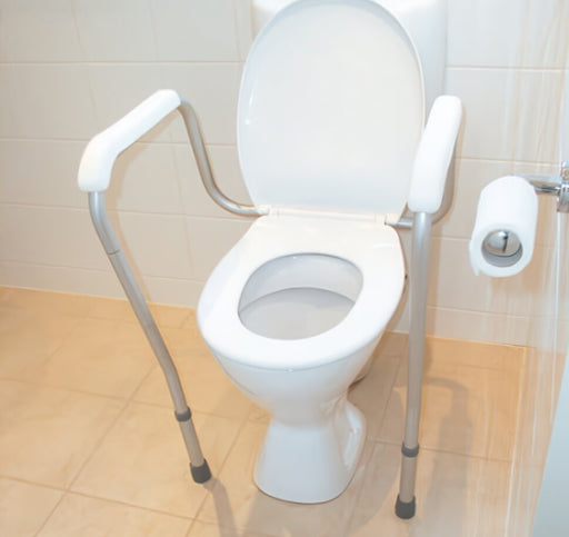 Oakwood over toilet frame with adjustable armrests - Mobility Plus NZ
