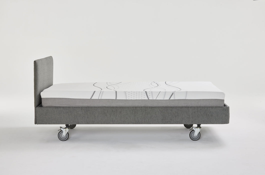 Side profile of the iCare IC100 partner bed showing its fixed 35.5cm platform height and castors