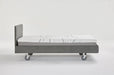 Side profile of the iCare IC100 partner bed showing its fixed 35.5cm platform height and castors