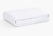 iCare absorbent bed pad NZ - reusable washable draw sheet with tuck-in flaps
