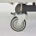 Close-up of a heavy-duty lockable swivel castor on the iCare IC100 partner bed