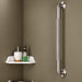 Goldfern stainless steel straight grab rail installed vertically on a shower wall beside a corner shelf